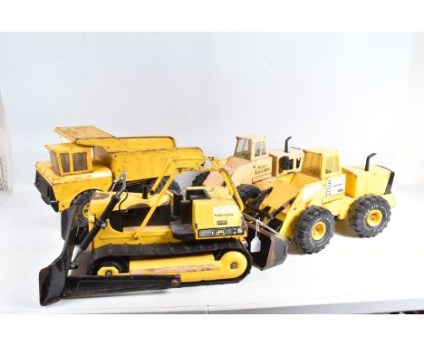 FOUR UNBOXED PLAYWORN MIGHTY TONKA TOYS CONSTRUCTION VEHICLES, c.1970's and later, two articulated Loading Shovels, one with 