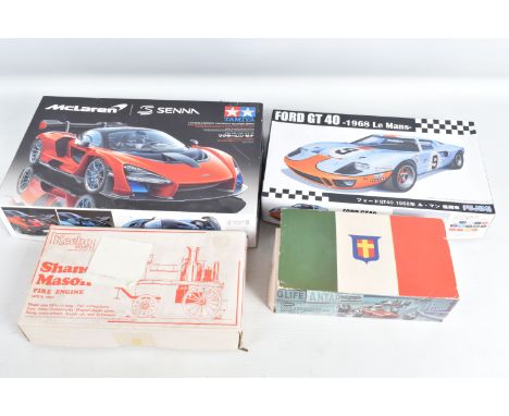 A BOXED 1:24 SCALE COX FORMULA 1 FERRARI, numbered 4702:198, appears new with parts still sealing in the box, plastic cover h
