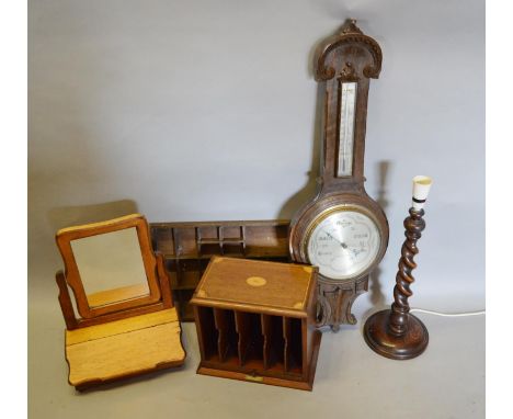 A Carved Oak Barometer Thermometer together with a Barley Twist Table Lamp and three other items 