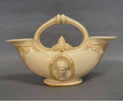 A Royal Worcester Blush Ivory Double Vase with figural decoration and highlighted with gilt, 28 cms long, model number 479 