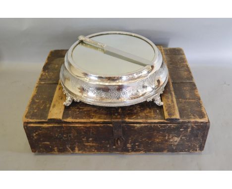 A Silver Plated Large Cake Stand of Circular Form with four scroll feet and mirrored top complete with cake knife and travell