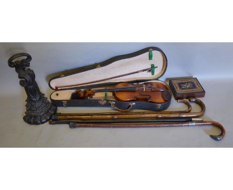 A Silver Mounted Walking Stick together with three other similar, a cased violin and a small work box and a door stop 