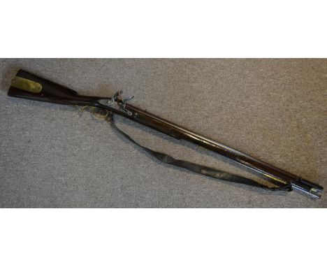An Unusual Early 19th Century Flintlock Rifle of Baker Form, the 30" barrel with bayonet bar to right hand side, the full len