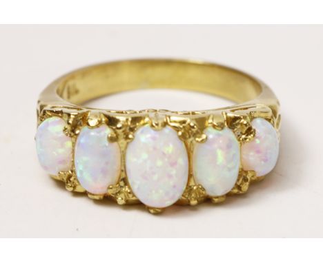 Five stone opal silver-gilt ring   Condition Report   Click here for further images, condition, auction times & delivery cost