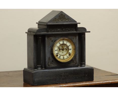 19th century Ansonia black slate mantel clock, with visible escapement, chiming the hours and halves on coil, H36cm   Conditi