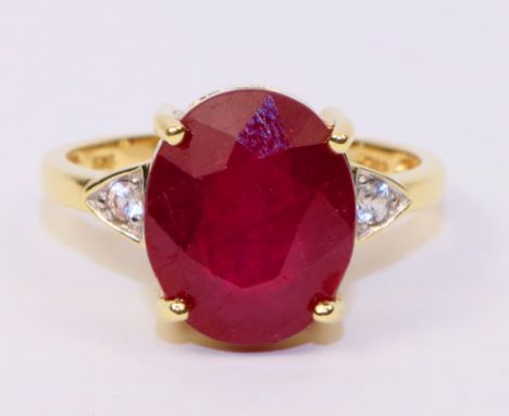 Hallmarked 9ct gold ruby ring with diamond shoulders   Condition Report   Click here for further images, condition, auction t
