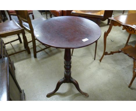 A Victorian mahogany circular tilt-top tripod wine table 