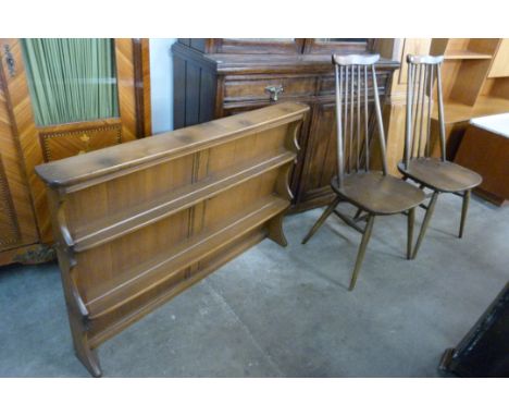 A pair of Ercol Golden Dawn elm and beech Goldsmith chairs and a plate rack 