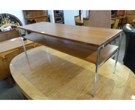 A teak and chrome two tier rectangular coffee table and a standard lamp 