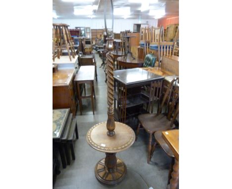 A French carved beech barleytwist standard lamp 