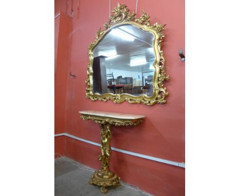A Rococo style gilt and faux marble console table and mirror 