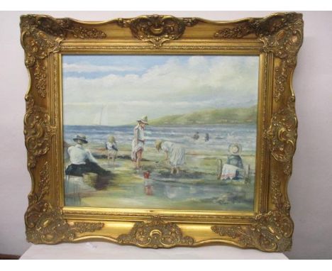 Peter Price - an Edwardian beech scene with figures resting and children playing in the sand, oil on board, signed lower righ