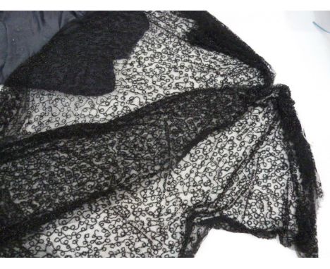 Length of black net embroidered with bugle beads, a devore black velvet shawl and another and a grey embroidered length of ma