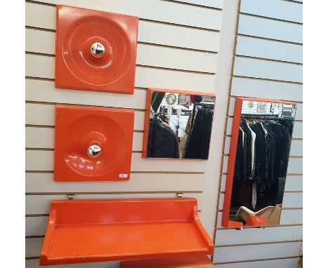 Pair of 20th century Schonbuch Furniture wall light fittings in orange plastic, a magnetic wall shelf and two mirrors (5) 