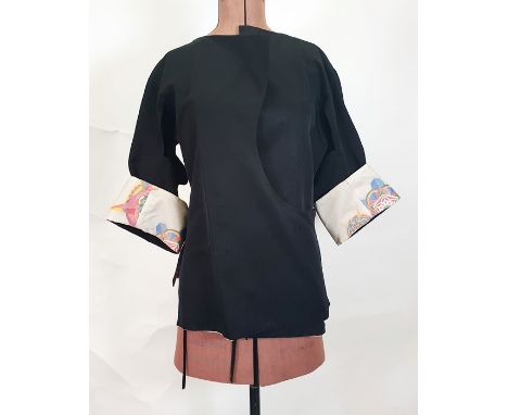 Yohji Yamamoto black cotton fold jacket with silk sleeves and printed detail to the cuffs and inner lining, tie and button fr