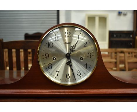 A reproduction mahogany cased Napoleon hat mantel clock