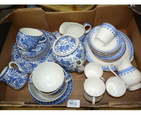 A part blue and white Japanese (Noritake) teaset including teapot, milk jug, slop bowl and cups and saucers, together with an