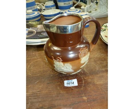 A Doulton stoneware silver rimmed Hunting jug.