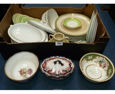 A part dinner service by Booths including five large soup bowls, three well worn and cracked, two vegetable dishes with lids 