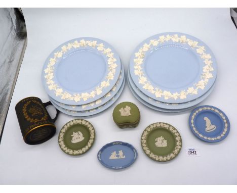 Six Wedgwood Cambridge blue plates having embossed cream ware rims of vines (10 1/2" diameter), a black basalt and gilt Comme