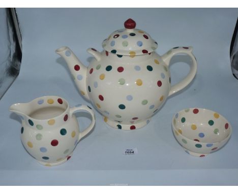 A large Emma Bridgewater cream ground spotted pattern one gallon Teapot, 11'' tall to top of finial, (some chips to base), ma