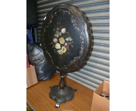 A papier mache snap-top occasional Table, the top decorated with flowers in polychrome colours and with mother of pearl highl