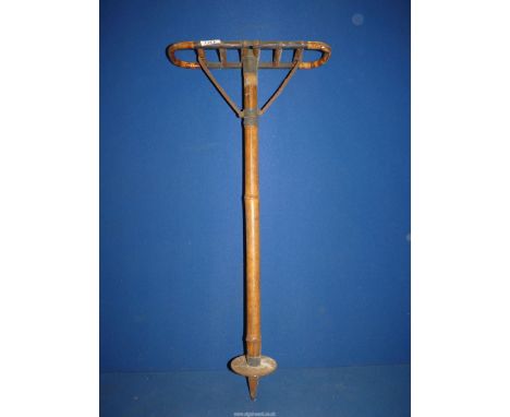 An old Cane/bamboo Shooting Stick having 'WSS' on the stick, 35" long.