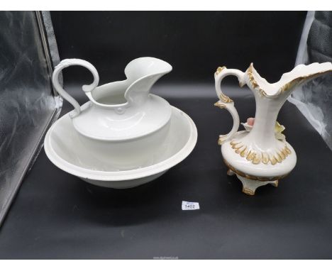 A Capo-di-monte floral jug and Burleighware bedroomware jug and basin. 