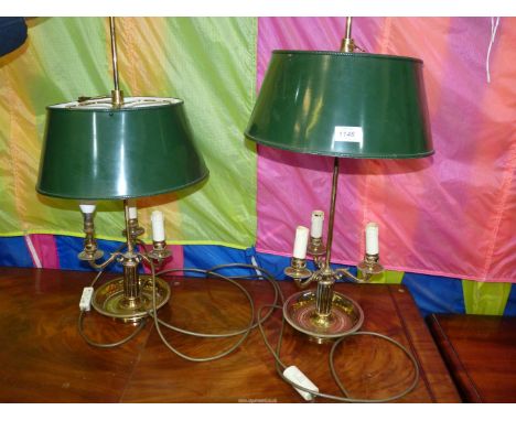 A pair of Bouillotte table Lamps with three brass candle effect light and green metal shades, 25" tall (requires rewiring).