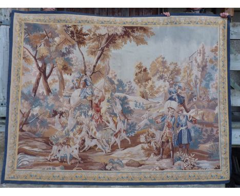 A large Flemish type wall hanging finely worked in wool and cotton, remarkably brightly and colourfully portraying a hunting 
