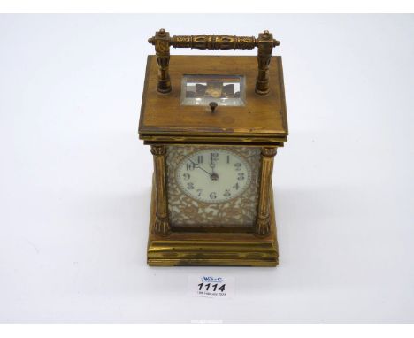 A late 19th century French brass cased repeating carriage clock with twin train movement striking on a gong, the dial with a 