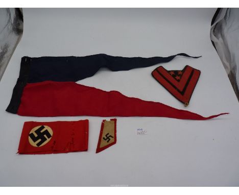 A Nazi cloth arm-band and shoulder patch, etc.,