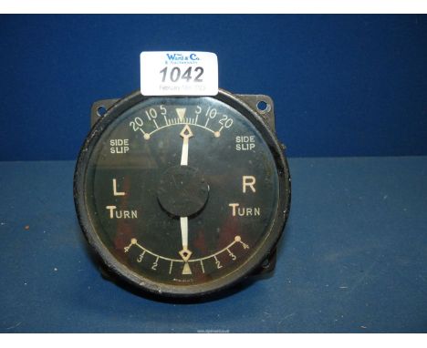 An Aircraft Instrument large diameter Turn and Side-Slip Indicator, 4 1/2'' c 45 1/2'' approx. and 4 1/4'' deep having 0-4 le