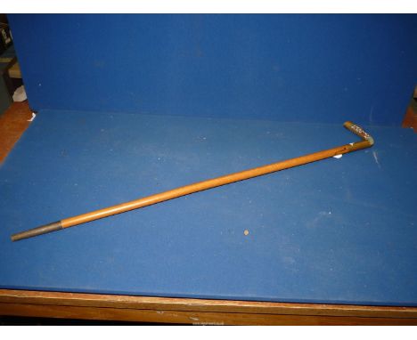 A lightwood Walking Stick having a brass and jade handle with the initials GJK on one side and TW Rees on the other and havin