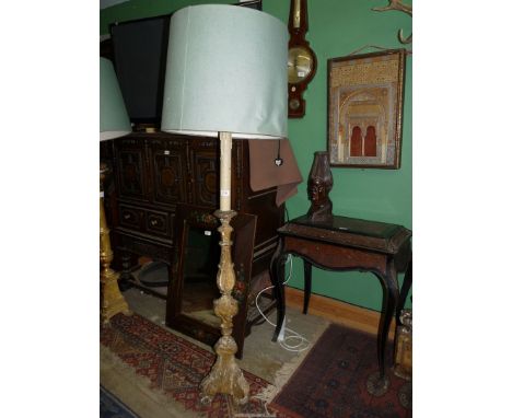 A shabby chic formerly gilt wood based floor/standard Lamp having a triple scroll footed base and 52 1/2'' high to the lamp h