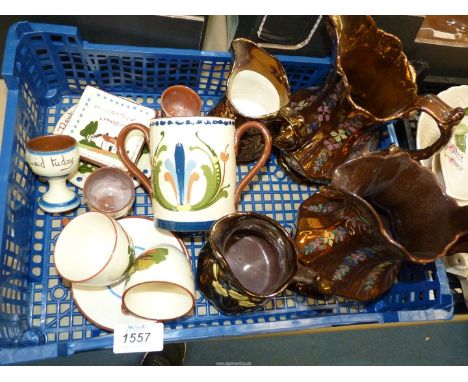 A small quantity of Torquay Pottery including; tankard, egg cups, cups &amp; saucers, etc (some a/f), together with 4 Lustre 