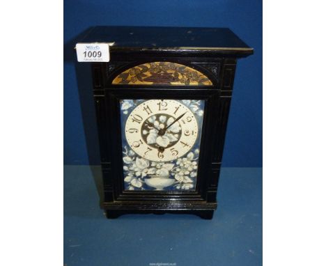 A rare late 19th century Aesthetic period mantel Clock in black lacquer having a painted face with Arabic numerals, complete 