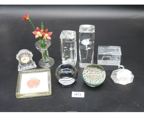 A quantity of glass including paperweights, crystal swan, small Waterford clock, etc.,