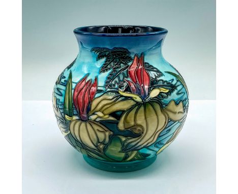 A blue glazed vase in the Sweet Betsy floral pattern. Excellent detailed tube lining. This item has its original box: 7.5"L x