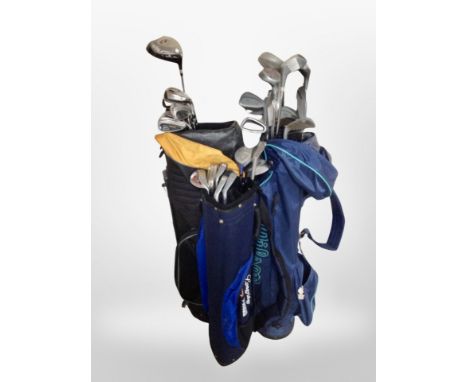 Three golf bags containing assorted irons and drivers, Slazenger, Howson etc 