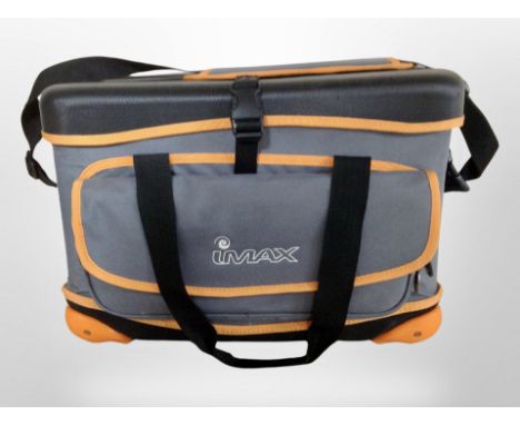 An Imax canvas fishing bag and contents to include spools of line, hooks, tools, etc.
