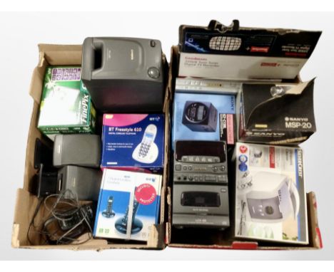 Two boxes containing household electricals, including Aiwa stereo speaker system, phones.