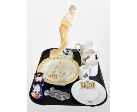 A continental Art Deco ceramic figure of a lady together with two Art Deco plates, royal commemorative china, two Royal Worce
