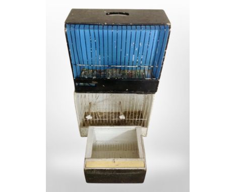 Three vintage wooden bird cages.
