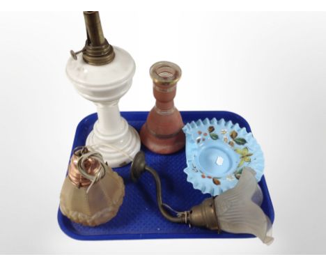 An opaque glass oil lamp base, together with a further early 20th century pendant light fitting, glass wall light, etc.