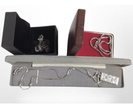 A silver ingot pendant on chain, together with a further silver box-link chain and a silver and enamel bracelet.