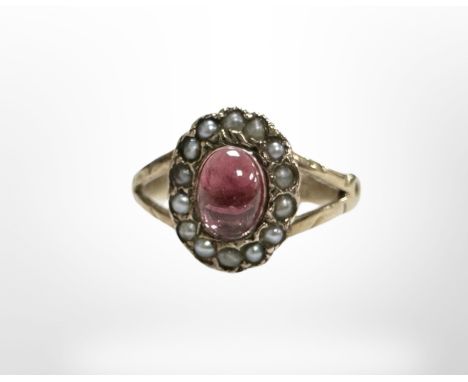 A 9ct yellow gold ruby and pearl cluster ring, size M. CONDITION REPORT: 1.7g