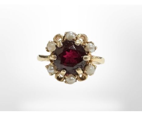 A 14ct yellow gold cluster ring set with synthetic ruby, size K.