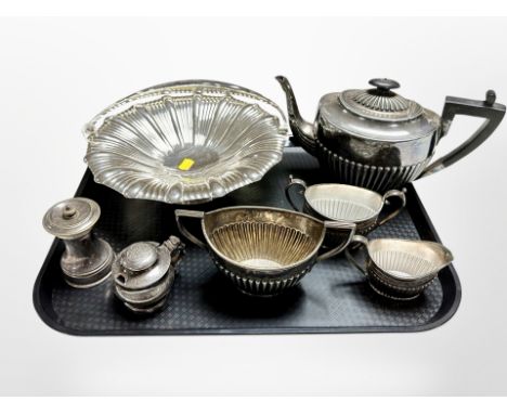 A group of plated wares including four piece tea service, pepper grinder, swing handled basket etc 