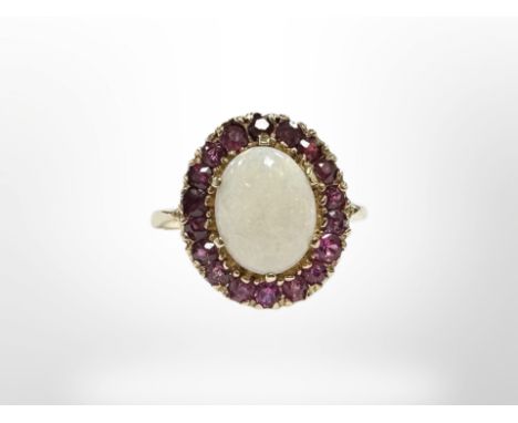 A 9ct yellow gold ruby and opal cluster ring, size L. CONDITION REPORT: 3.3g.